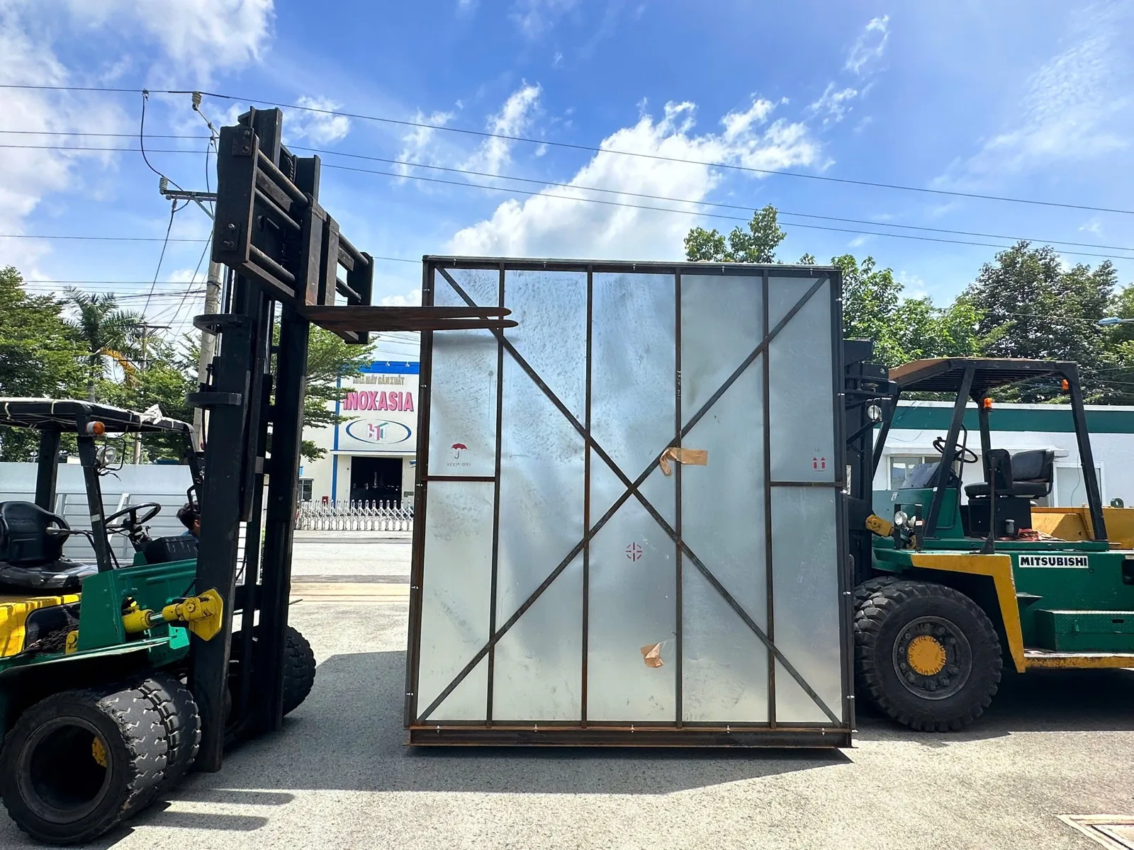 Reinforced machinery crate prepared for lifting